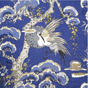 A blue fabric with trees and birds.