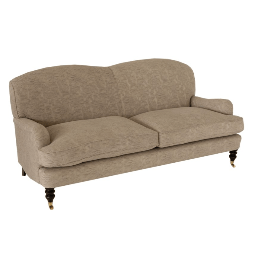 A natural brown coloured two seater Charleston sofa.