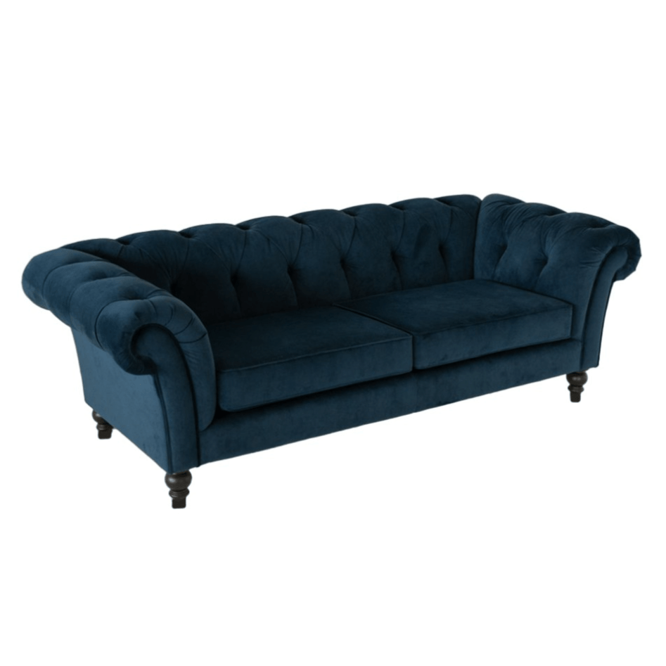 A blue velvet chesterfield two seater sofa.