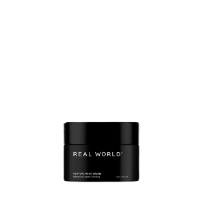 A small black round jar with the Real World branding.