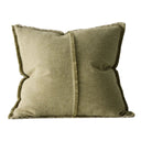 Two green textured pillows on a white background