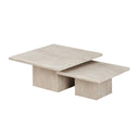 Beige travertine nesting tables on a white background
