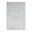 Gray area rug with a diamond pattern on a white background