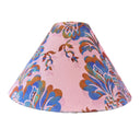 Colorful floral psychedelic patterned lampshade on a pink background
