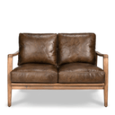 Brown leather sofa with wooden frame on a white background