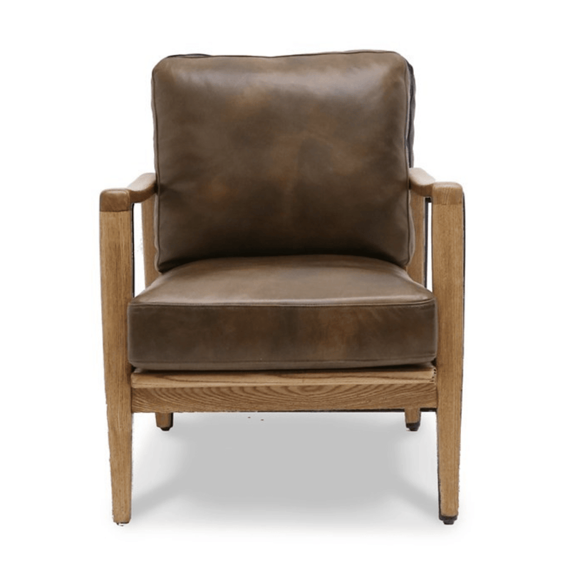 Brown leather armchair with wooden frame on a white background