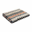Missoni Bernard 160 Bath Towel with orange, black, white, and yellow chevron zigzag patterns in a white background