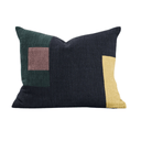 A rectangle throw pillow with a modern abstract patchwork design, featuring a dark navy blue base with a dark green block, a dusty rose square, and a mustard yellow vertical panel on a white background.