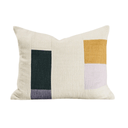 A rectangle decorative throw pillow with a textured cream linen base and a modern abstract geometric block pattern in mustard yellow, dark green, light purple, and lavender.