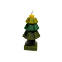 Tree-shaped candle with green layers and a yellow center on a white background