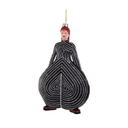 A David Bowie Christmas ornament shaped like him in a black and white striped gown, with red hair and shoes, hanging against a plain white background.