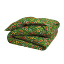 Green with orange and yellow floral patterned comforter on a white background