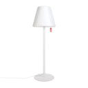 White floor lamp with a white shade on a white background