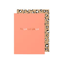 Coral Christmas holiday greeting card with 'FA LA LA LA LA' text and leopard print on a white background