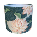 Decorative lampshade with water lilies and leaf pattern on a white background