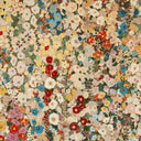 Multicolored floral pattern with various flowers on a textured background