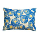 Decorative pillow with blue floral pattern on a white background