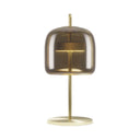 Table lamp with brown smoked glass shade and matte gold base on a white background