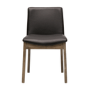 Black leather chair with wooden legs on a white background