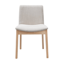 Chair with off white upholstered backrest and seat on a white background