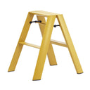 Lucano 2-step stool in mustard yellow on a white background