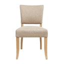 Beige upholstered chair with wooden legs on a white background
