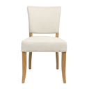 White upholstered chair with wooden legs on a white background