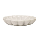 White marble bowl with a textured surface on a white background