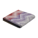 Folded Missoni Home Marea 100 hand towel with geometric chevron pattern on a white background