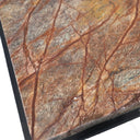 Close-up of a stone surface with brown and gray patterns