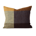 A rectangle throw pillow with a patchwork design in mustard yellow, light blue, dark blue, and dark brown textured fabrics, shown against a plain white background.