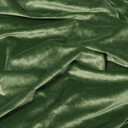 Close-up of green velvet fabric with folds