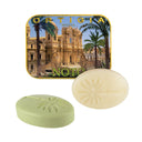 Two soaps with a decorative tin featuring 'Ortigia Noto' on a white background.