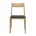 Wooden chair with a black leather seat on a white background