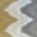 Textured fabric with chevron zigzag pattern in gold, gray, and white