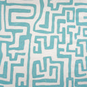 Teal geometric pattern on a white background
