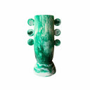 Green swirl vase with spherical protrusions on a white background