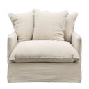 Beige armchair with three pillows on a white background