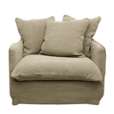 Beige armchair with three cushions on a white background