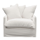White pillow on a white armchair with a white background