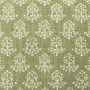 White floral pattern on a textured green fabric background