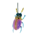 A hanging beetle-shaped ornament with a glittery purple body, iridescent green and gold head, and translucent blue legs on a plain white background.