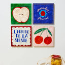 Four colorful wall tiles with different designs on a white background