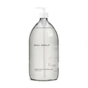 Real Word Tomato Leaves Dishwashing Liquid on a clear glass bottle on a white background