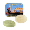 Two soaps with a decorative tin featuring an Ortigia Sicilia Venezia design on a white background.