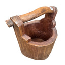 Wooden bucket with handle on a white background