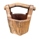 Wooden bucket with handles on a white background