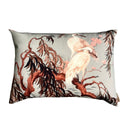 Decorative pillow with bird and leaf design on a white background