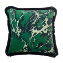 Decorative pillow with green and black abstract pattern on a white background