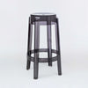One medium Charles Ghost stool in the colour smoke grey.